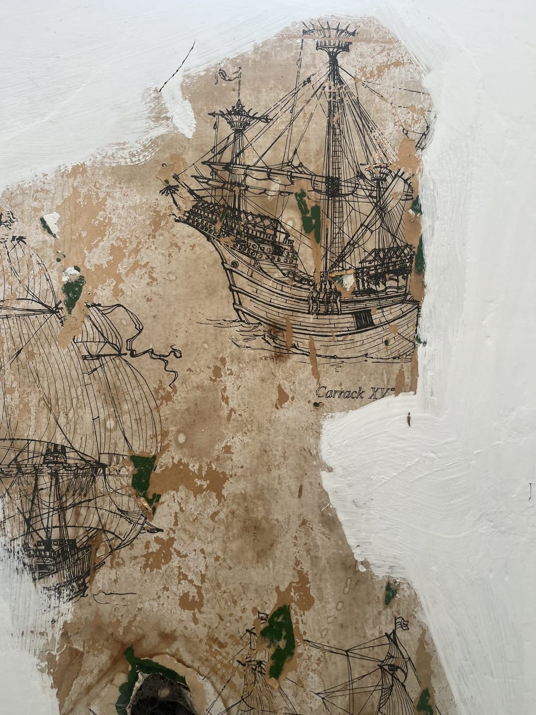 Historic wall decoration peeling away